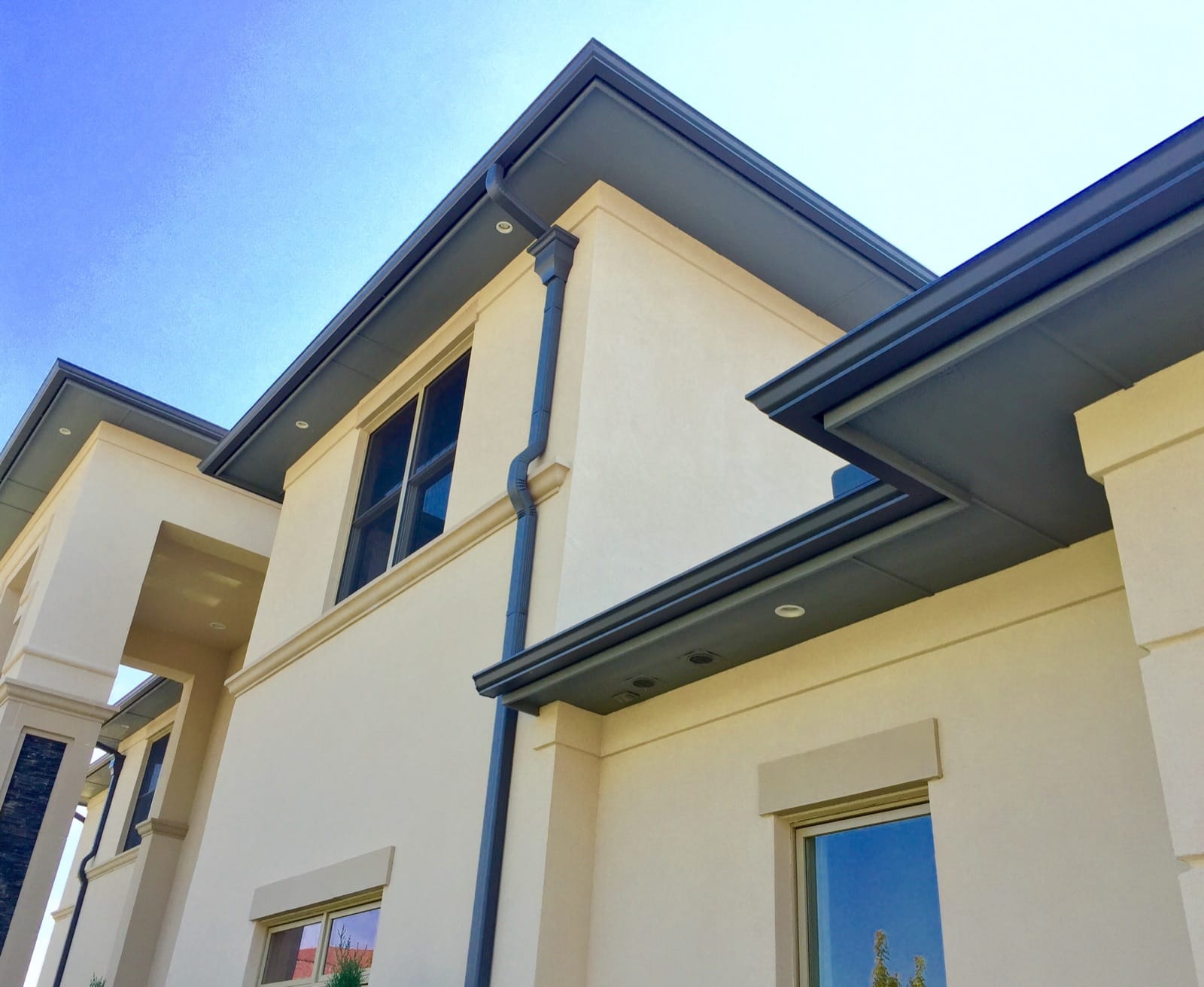 A real installed K-style gutter — close-up of the eave line.